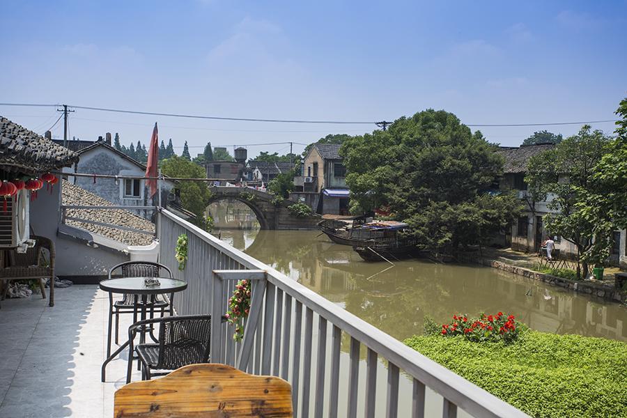 Wuzhen Helan Bridge Inn Tongxiang Bagian luar foto