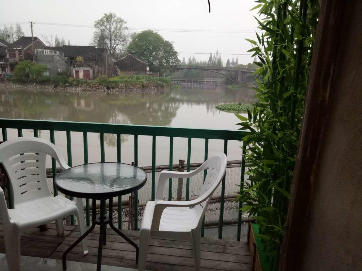 Wuzhen Helan Bridge Inn Tongxiang Bagian luar foto