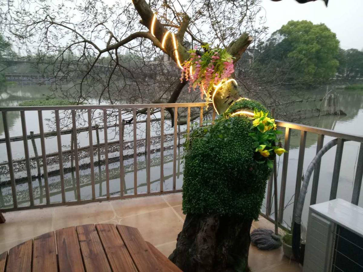 Wuzhen Helan Bridge Inn Tongxiang Bagian luar foto