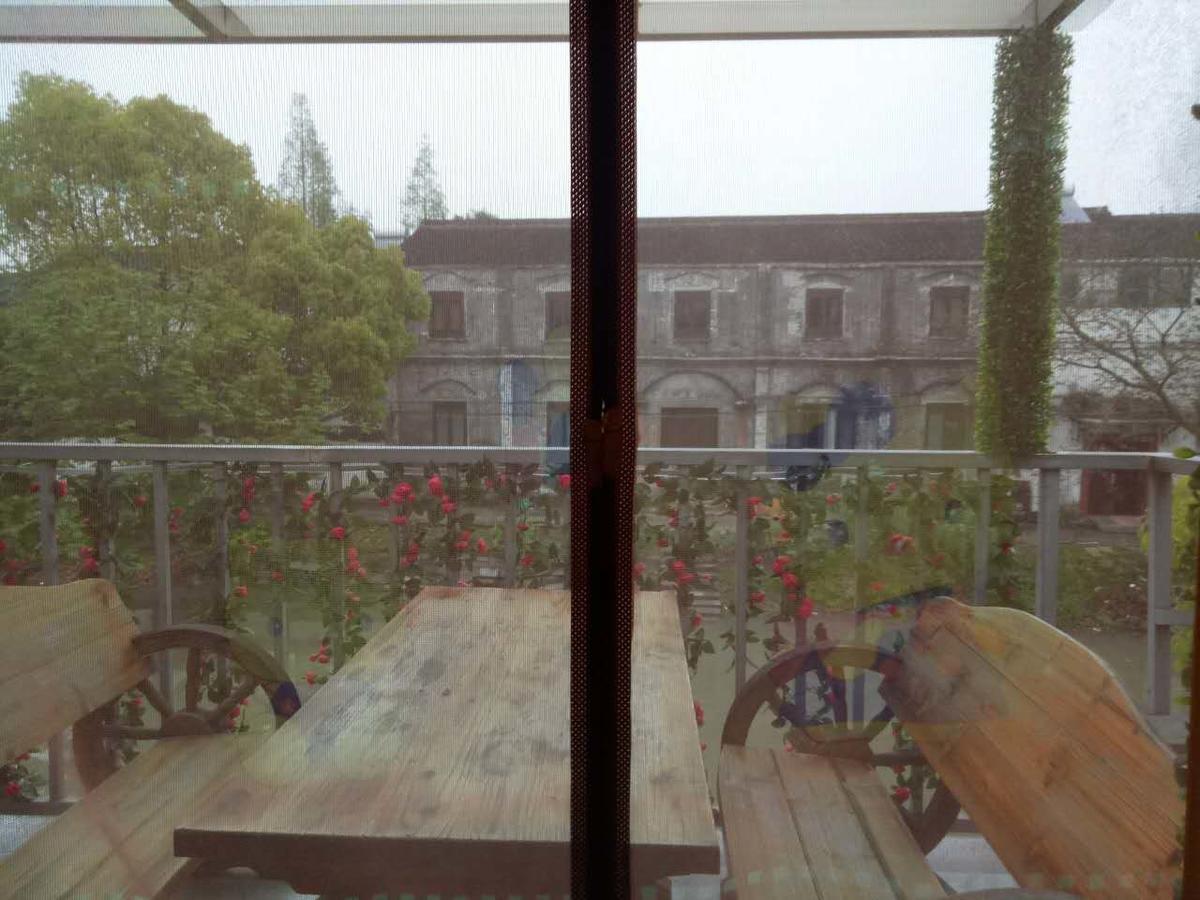 Wuzhen Helan Bridge Inn Tongxiang Bagian luar foto